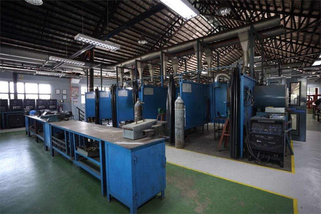 Shielded metal arc welding booths